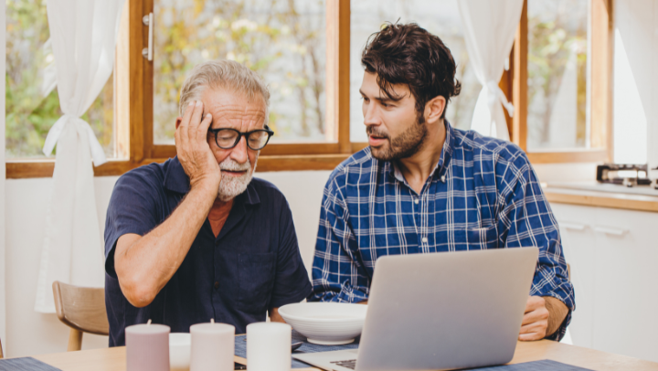 an old man and his son talking